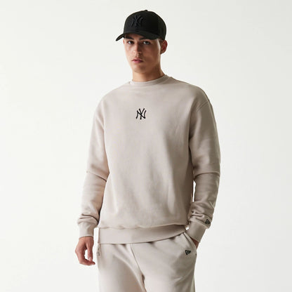 The Male model is wearing New York Yankees MLB League Essential Midi Cream Oversized Crew Neck Sweater 3
