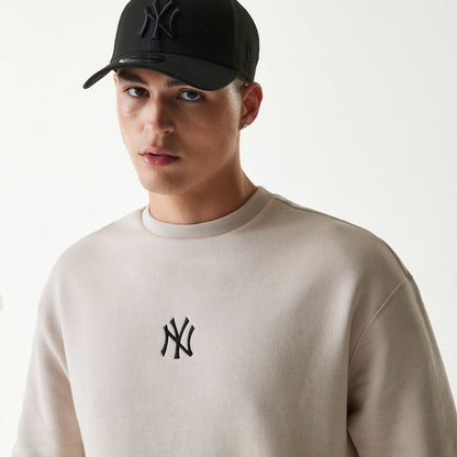 The Male model is wearing New York Yankees MLB League Essential Midi Cream Oversized Crew Neck Sweater 4