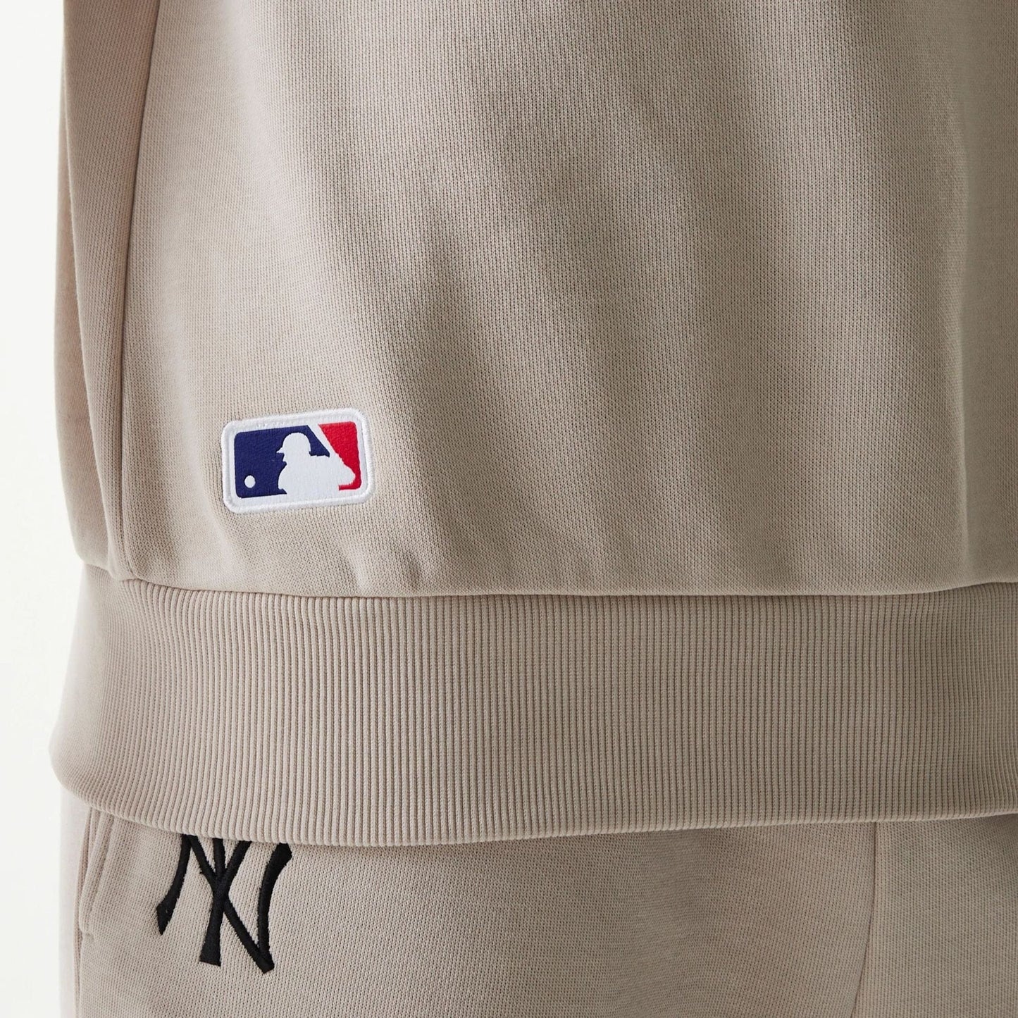 The Male model is wearing New York Yankees MLB League Essential Midi Cream Oversized Crew Neck Sweater 6