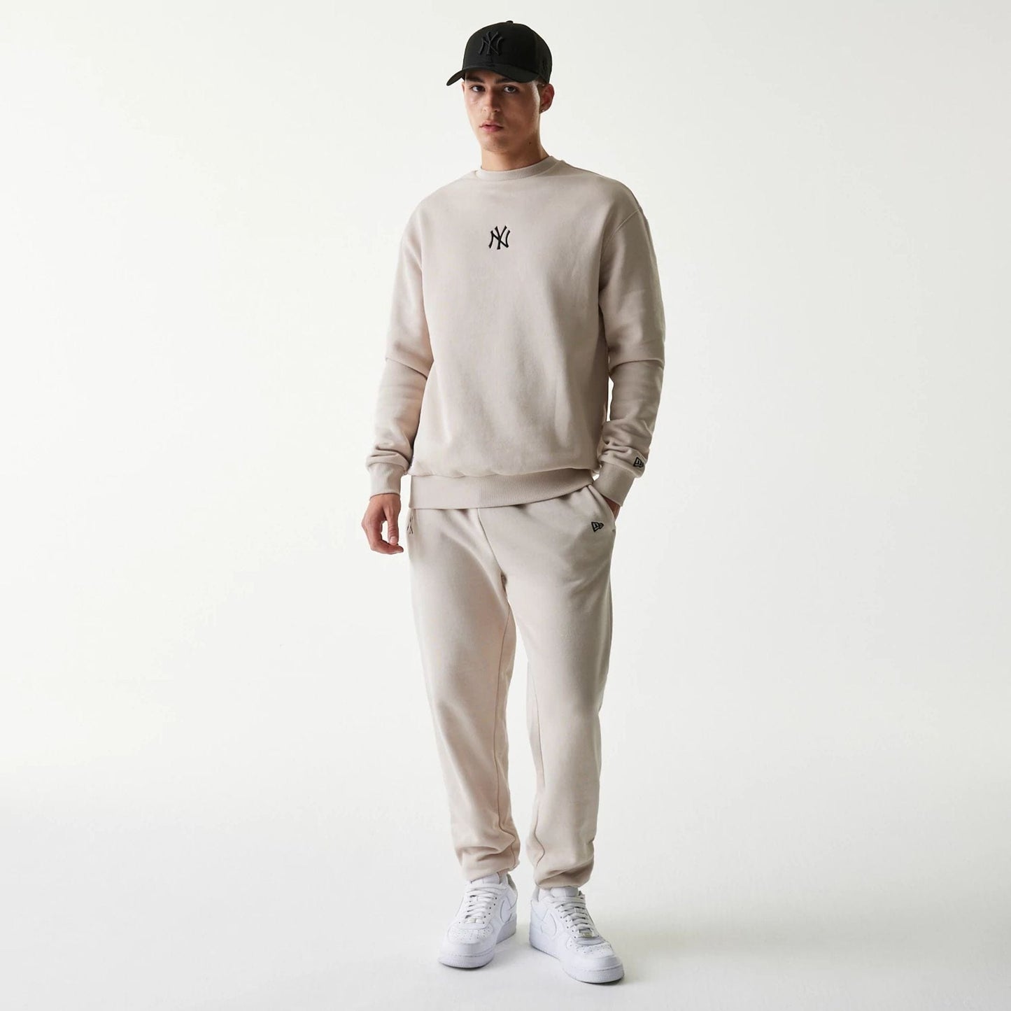 The Male model is wearing New York Yankees MLB League Essential Midi Cream Oversized Crew Neck Sweater 8