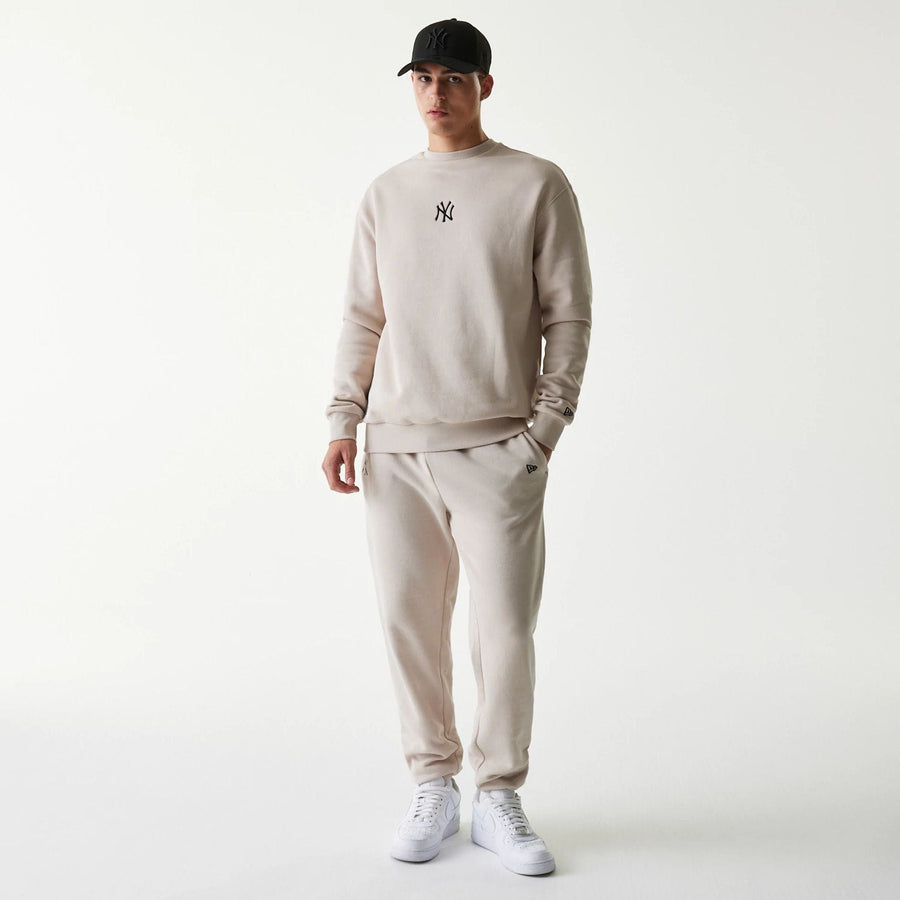 The Male model is wearing New York Yankees MLB League Essential Midi Cream Oversized Crew Neck Sweater 8