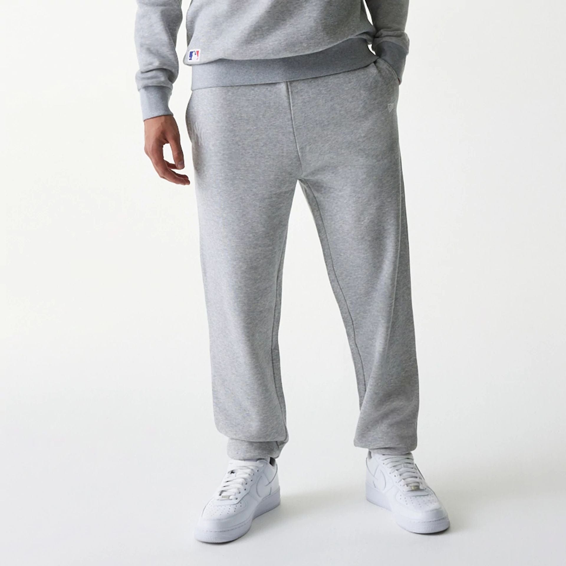The Male model is wearing New York Yankees MLB League Essential Grey Joggers 6