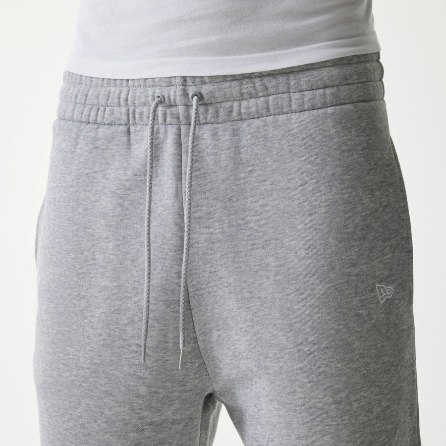 The Male model is wearing New York Yankees MLB League Essential Grey Joggers 3