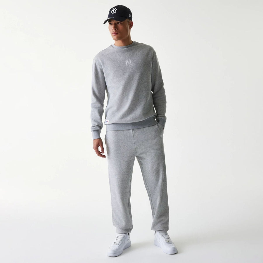 The Male model is wearing New York Yankees MLB League Essential Grey Joggers 8