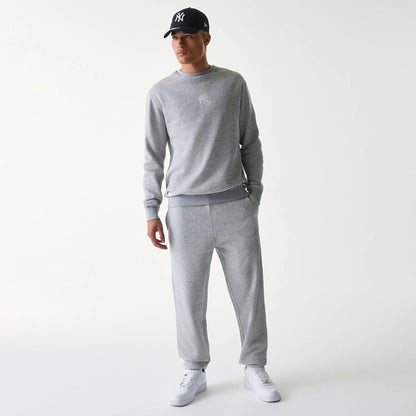 The Male model is wearing New York Yankees MLB League Essential Grey Joggers 8