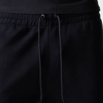 The Male model is wearing New York Yankees MLB League Essential Midi Black Shorts 6
