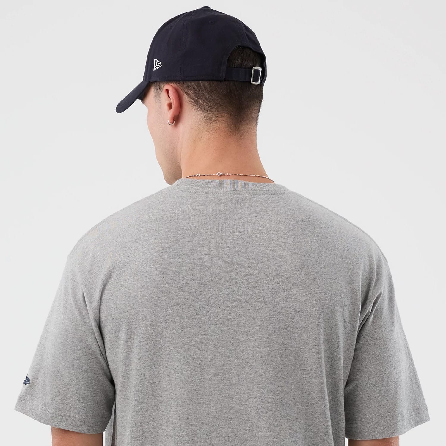 The Male model is wearing Vancouver Canucks NHL Sport Classic Grey T-Shirt 5