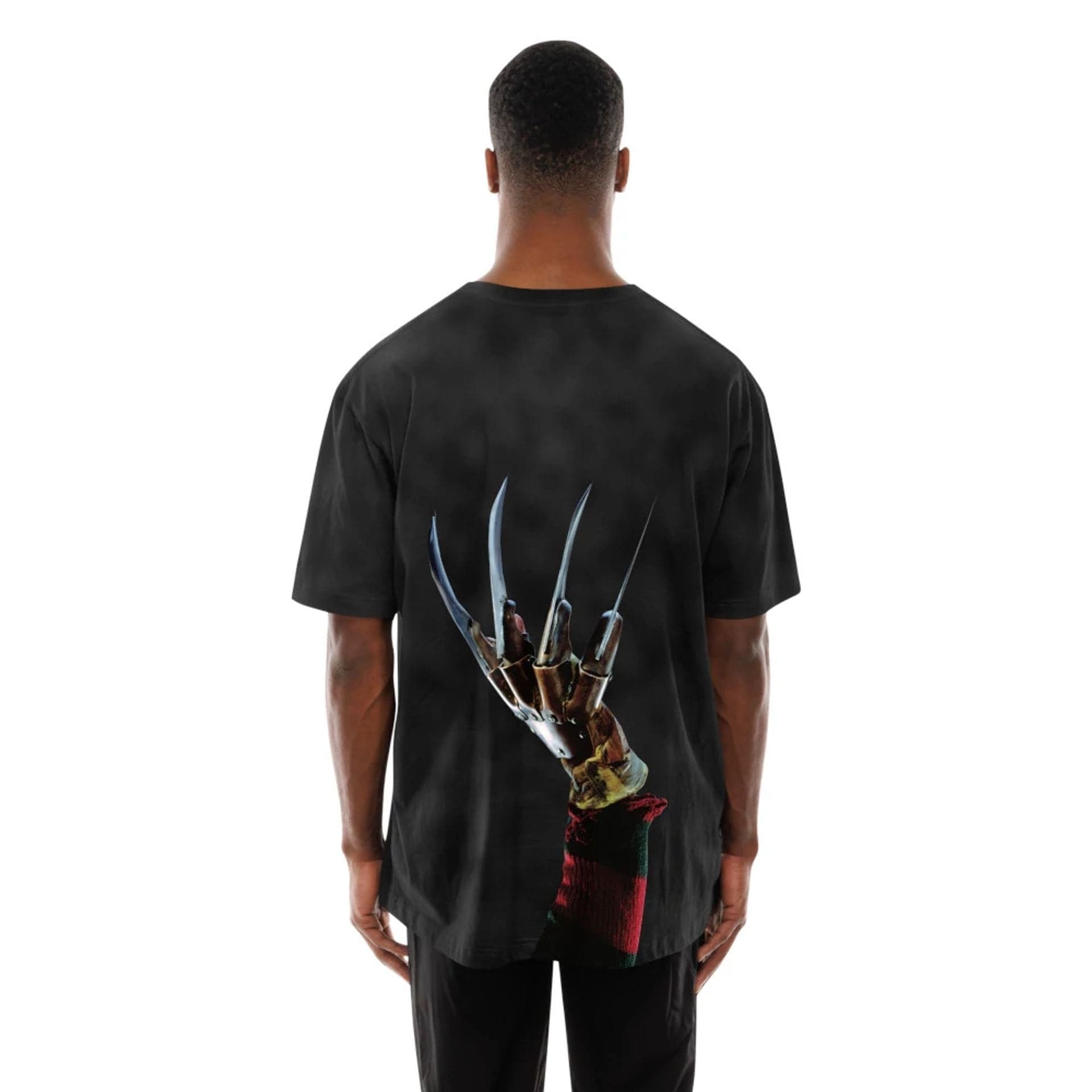 The Male model is wearing A Nightmare On Elm Street Life Graphic Black T-Shirt 2