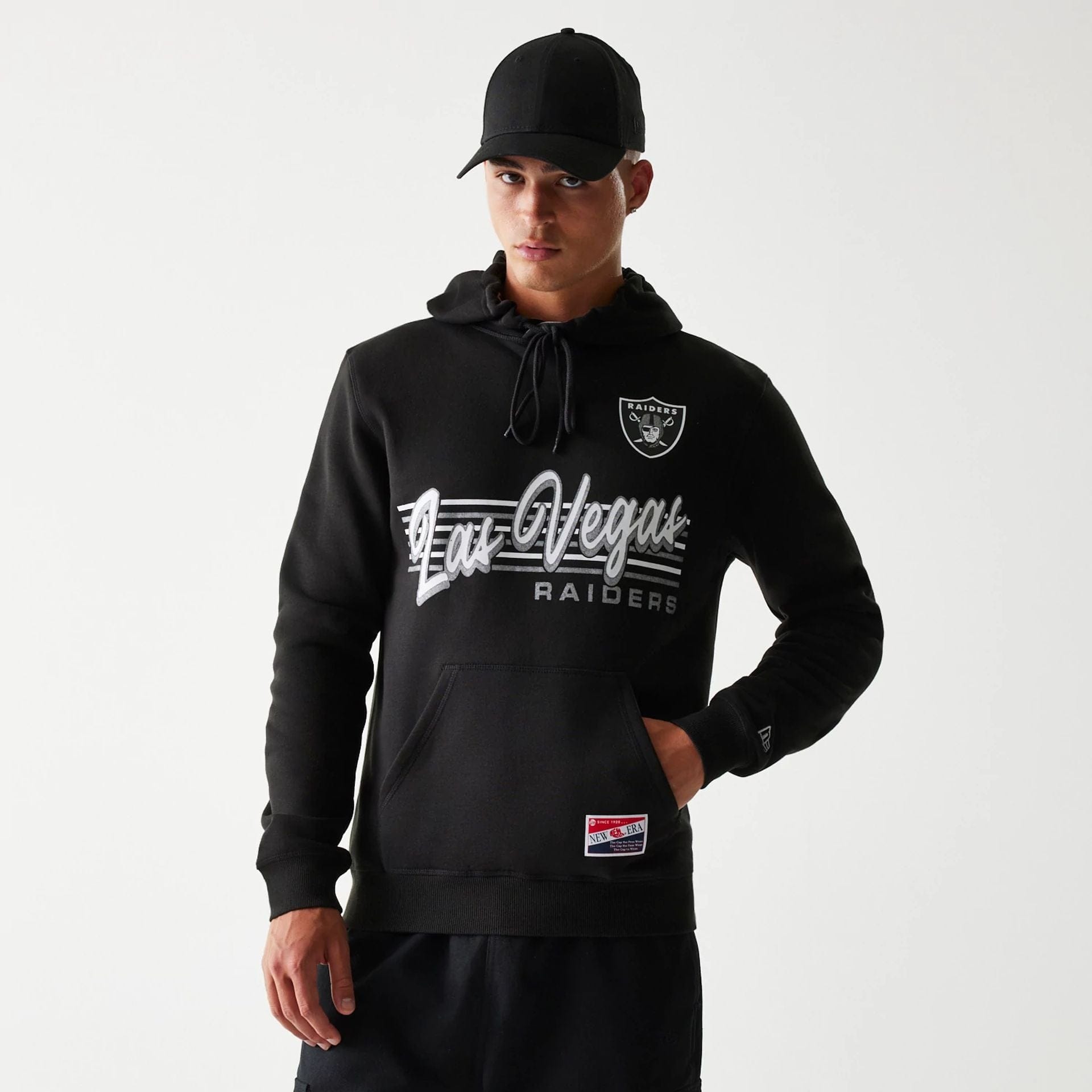 The Male model is wearing Las Vegas Raiders NFL Throwback Black Pullover Hoodie 1
