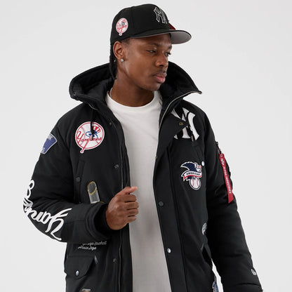 The Male model is wearing New York Yankees MLB X Alpha Black Parka Jacket 3