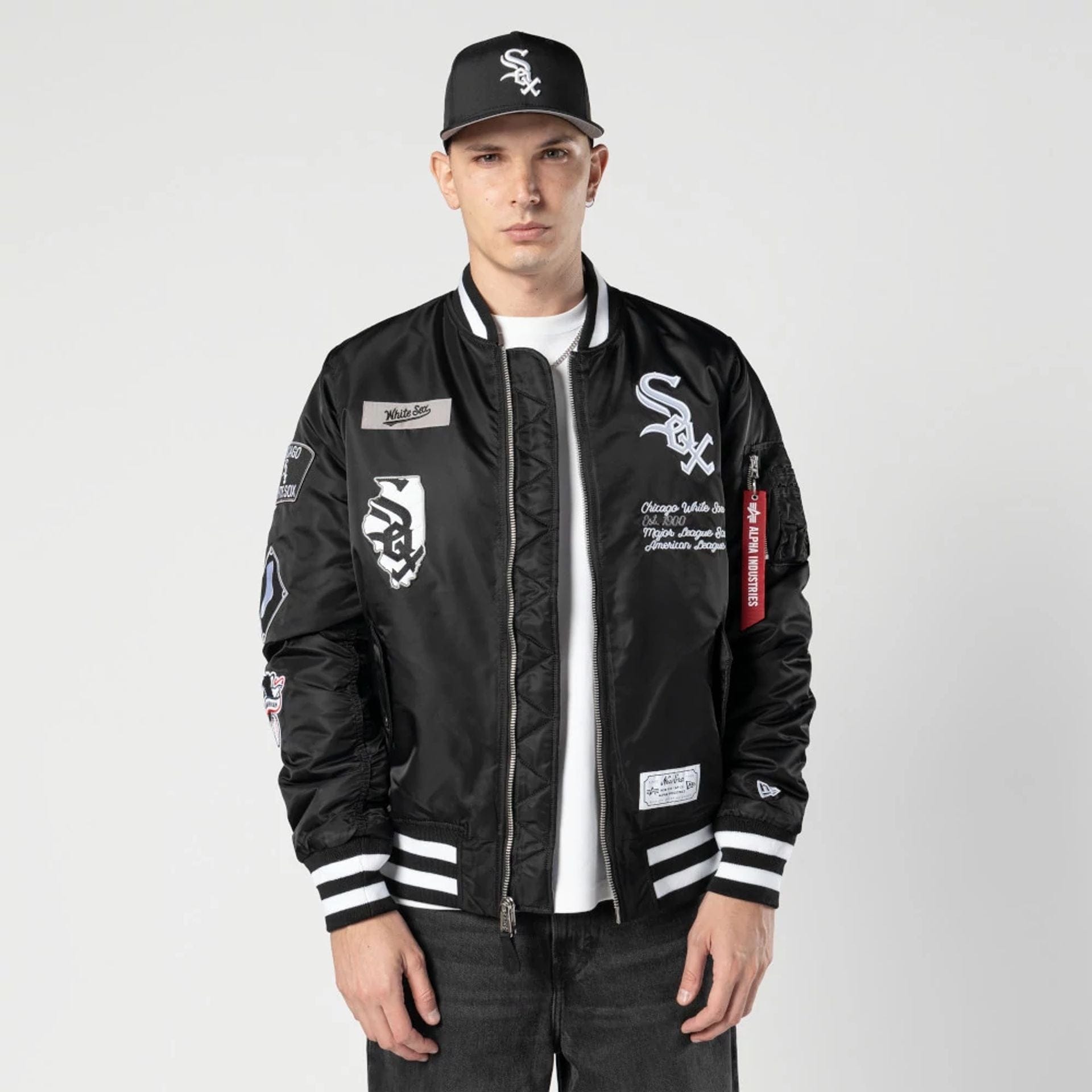 The Male model is wearing Chicago White Sox MLB X Alpha Black Bomber Jacket 1