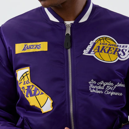 The Male model is wearing LA Lakers NBA x Alpha Purple Jacket 4