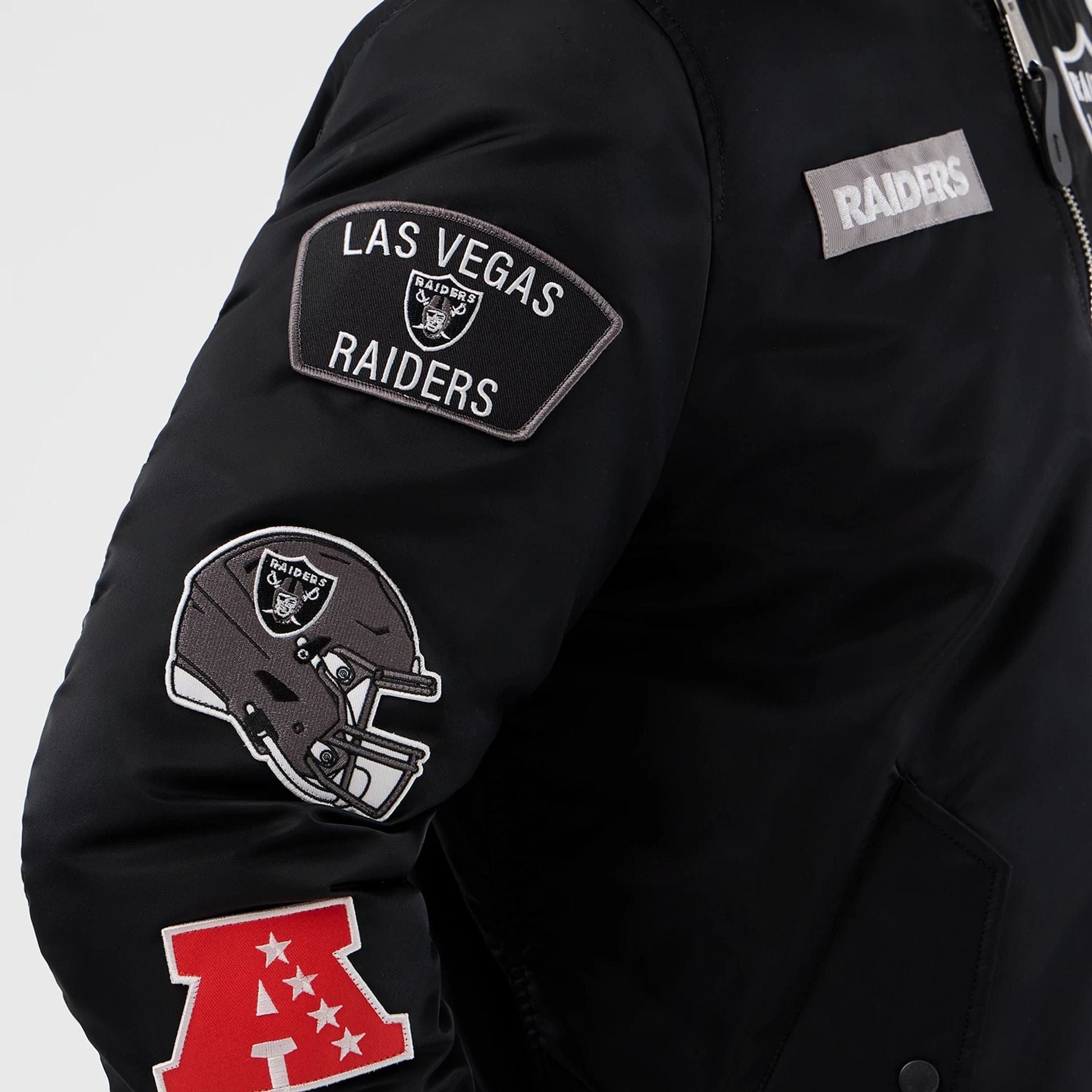 The Male model is wearing Las Vegas Raiders NFL x Alpha Black Jacket 6