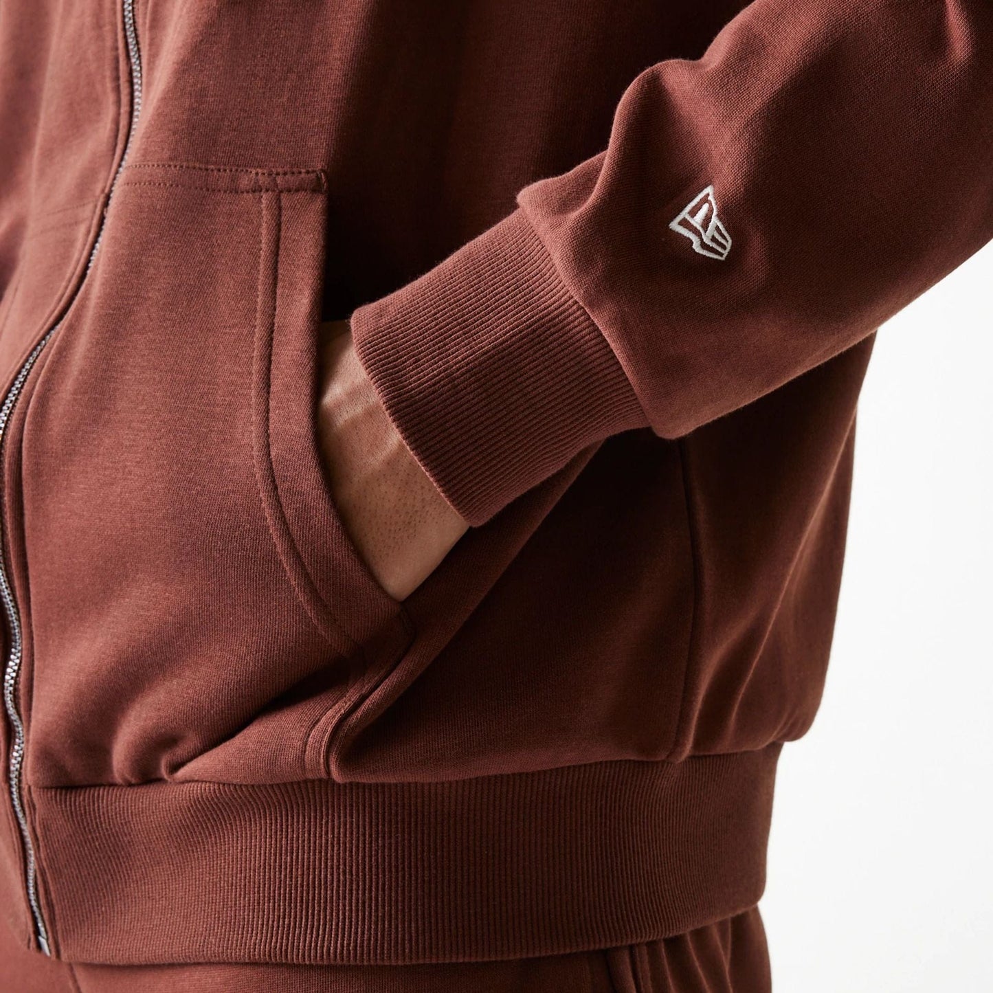 The Male model is wearing New York Yankees MLB Midi League Essential Brown Oversized Full Zip Hoodie 7