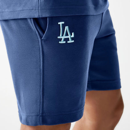 The Male model is wearing LA Dodgers MLB Midi League Essential Dark Blue Shorts 3