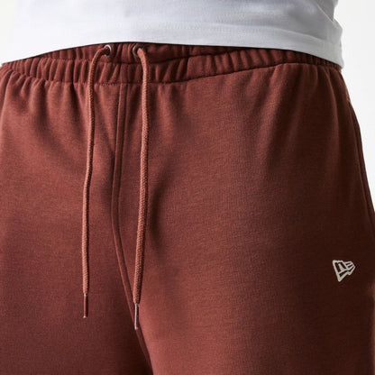 The Male model is wearing New York Yankees MLB Midi League Essential Brown Joggers 6