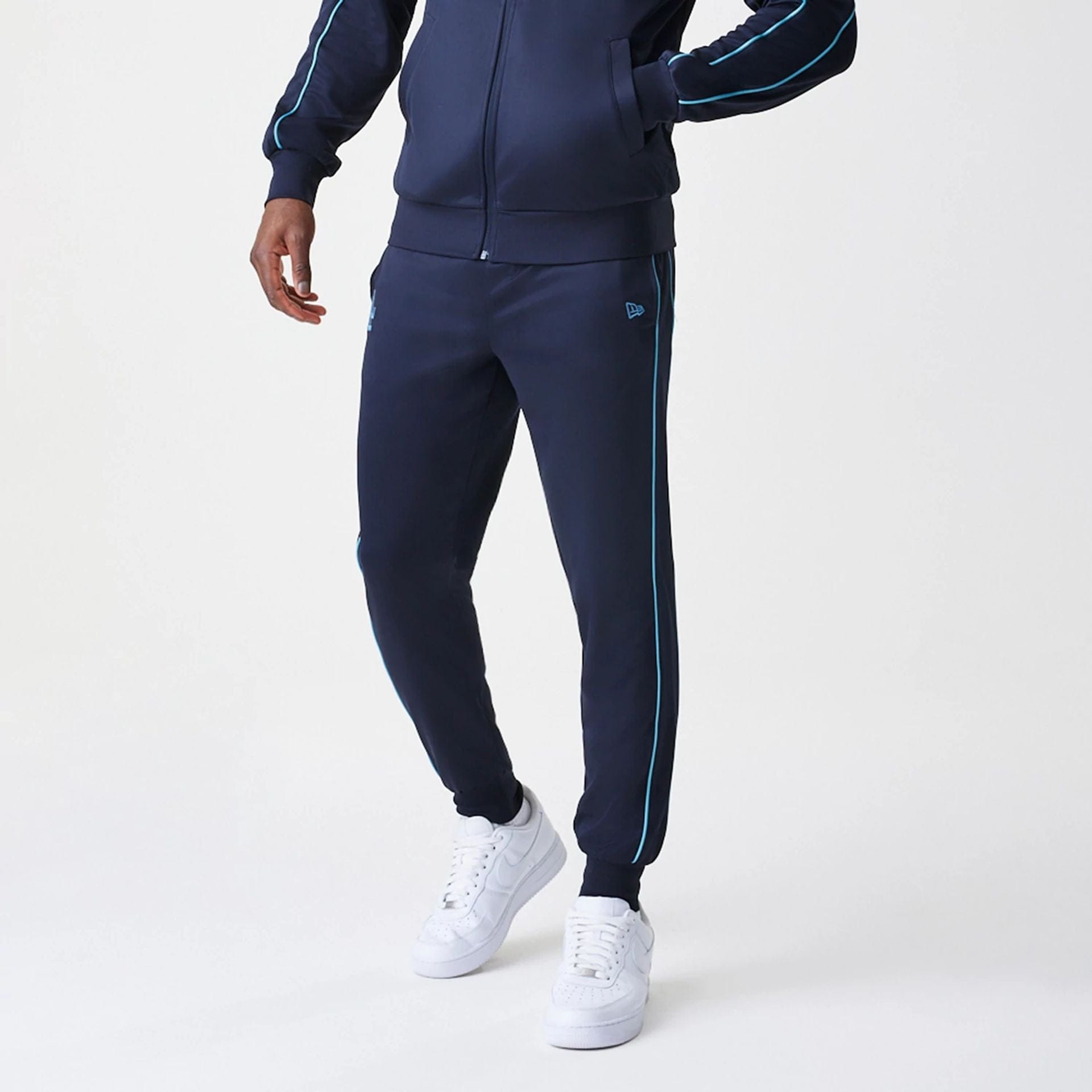The Male model is wearing LA Dodgers MLB Navy Track Pants 3