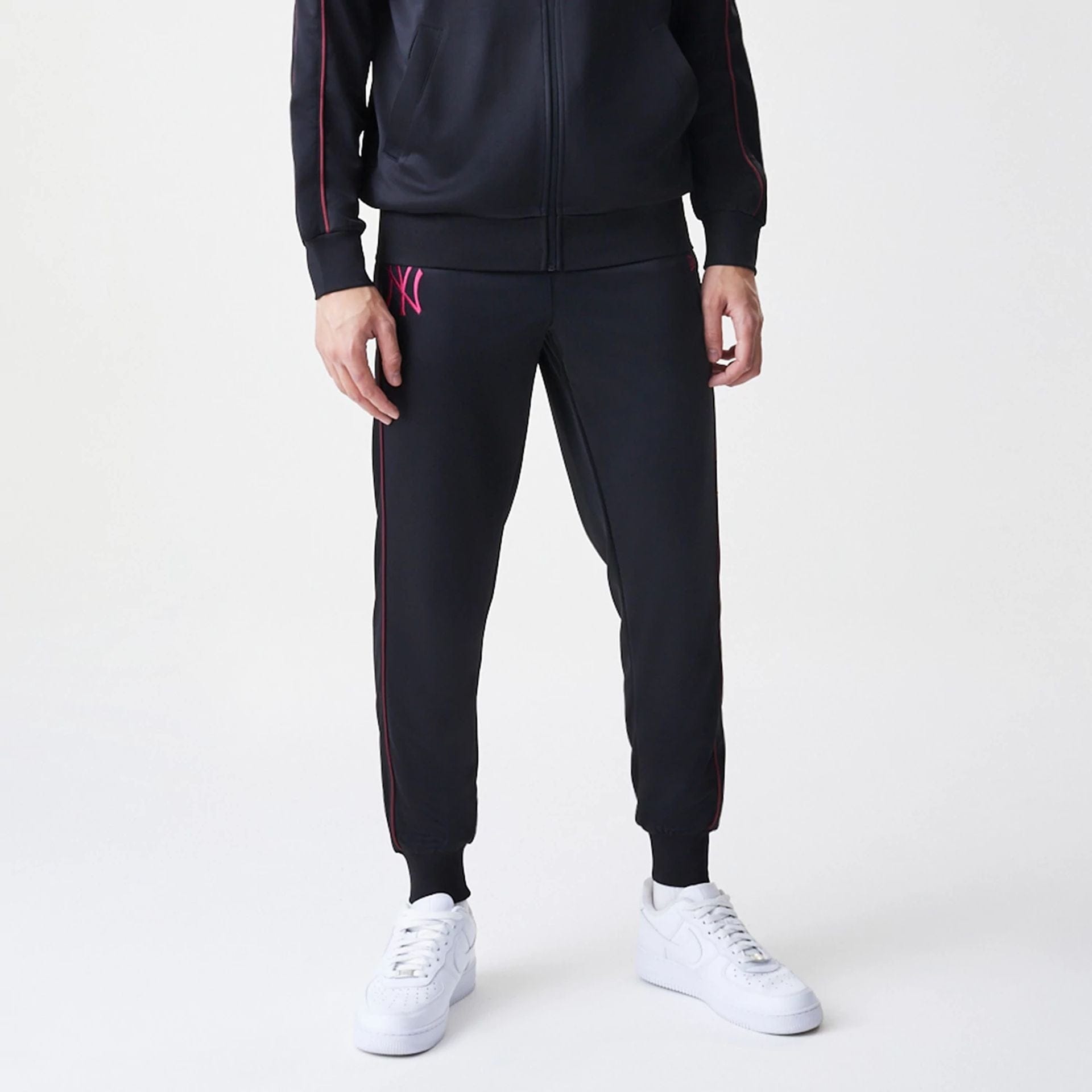 The Male model is wearing New York Yankees MLB Black Track Pants 3