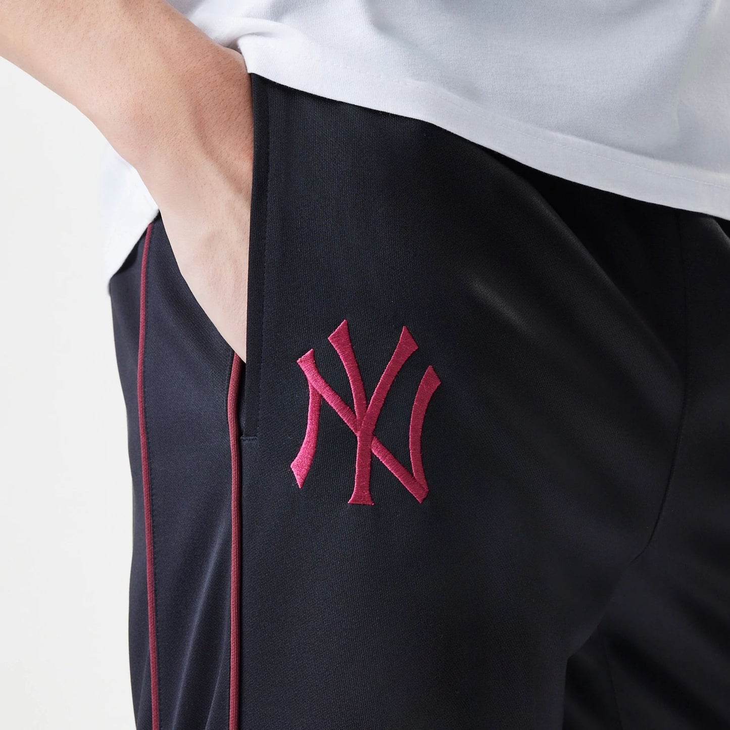 The Male model is wearing New York Yankees MLB Black Track Pants 4