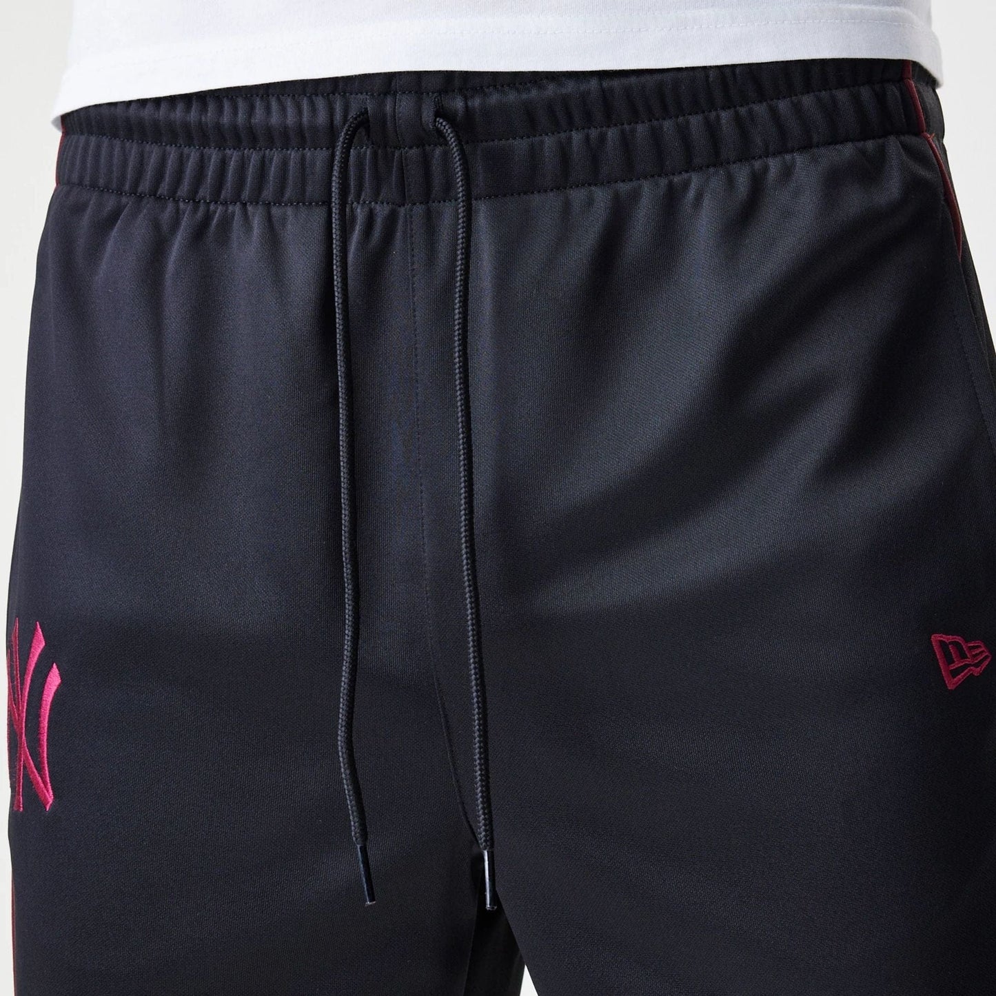 The Male model is wearing New York Yankees MLB Black Track Pants 6