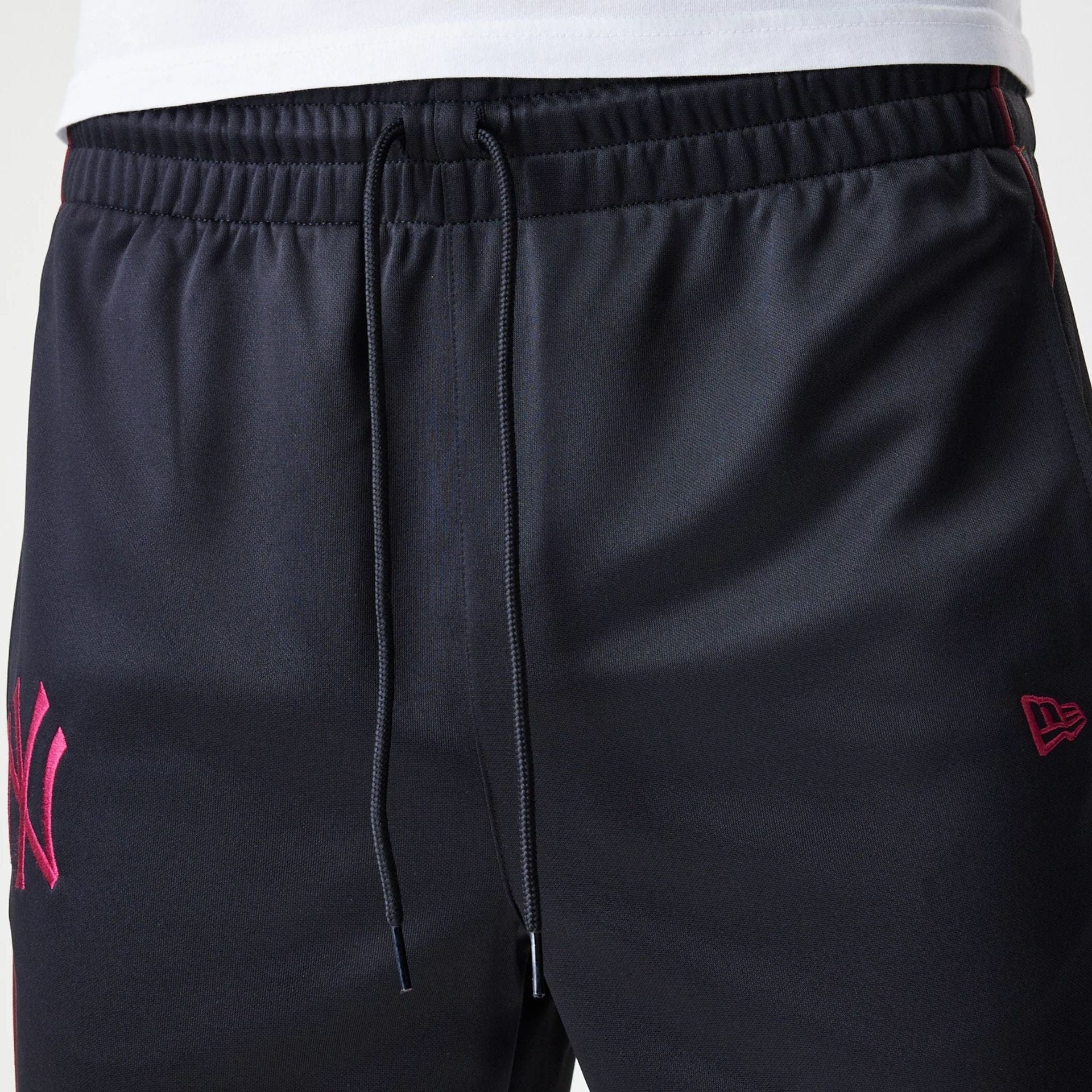 The Male model is wearing New York Yankees MLB Black Track Pants 6