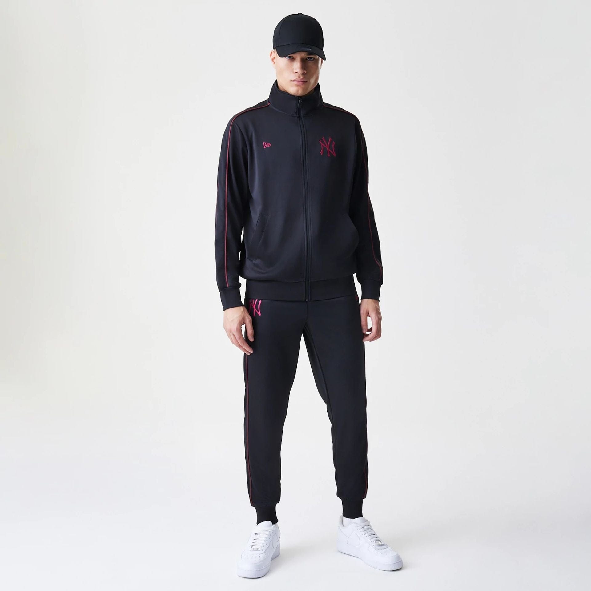 The Male model is wearing New York Yankees MLB Black Track Pants 8