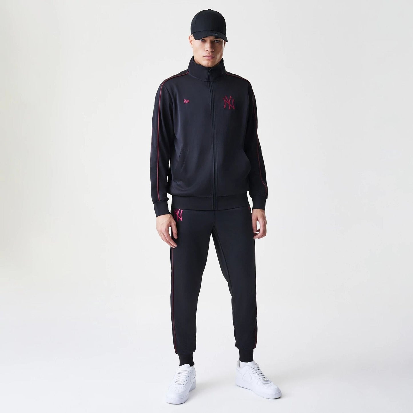 The Male model is wearing New York Yankees MLB Black Track Pants 8