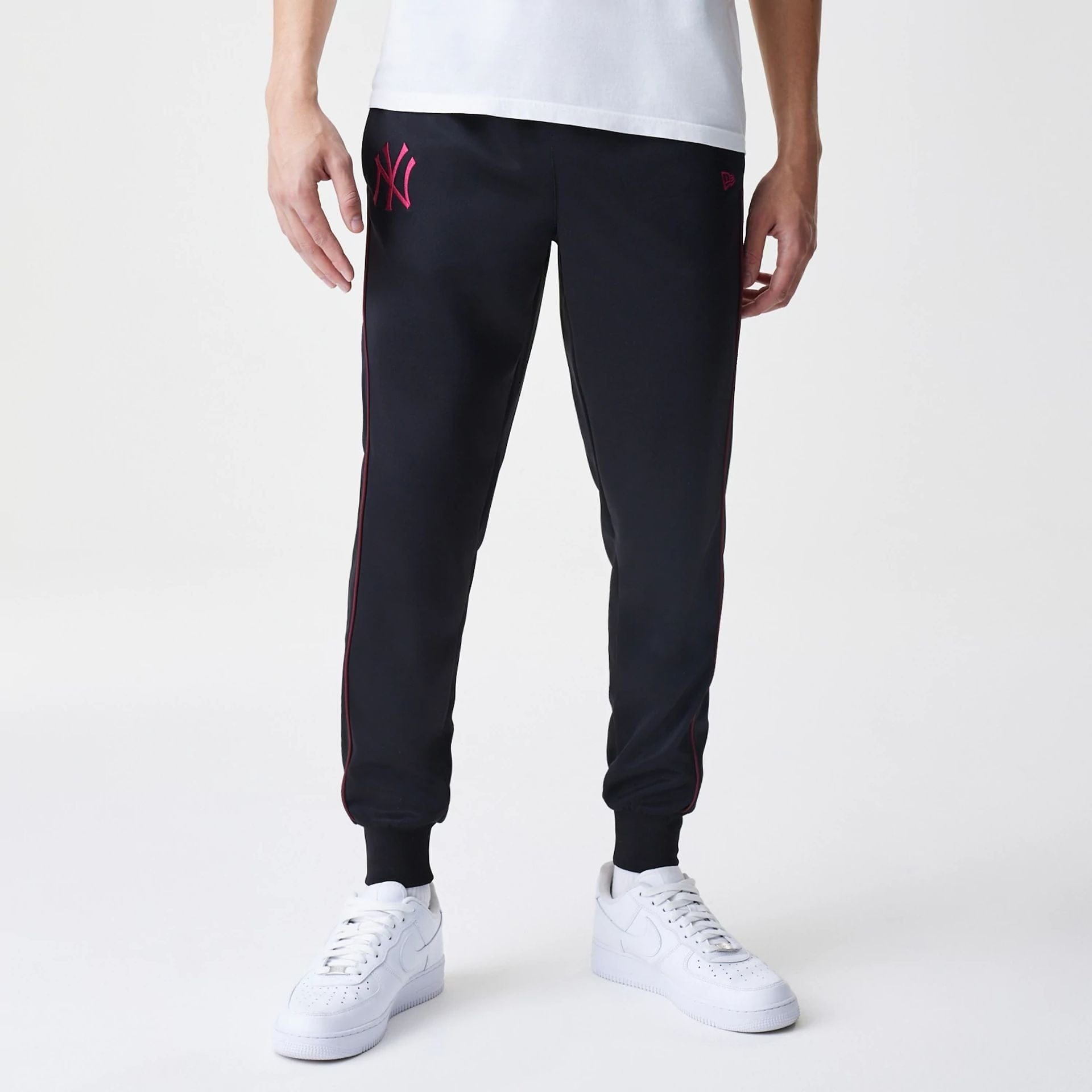 The Male model is wearing New York Yankees MLB Black Track Pants 1