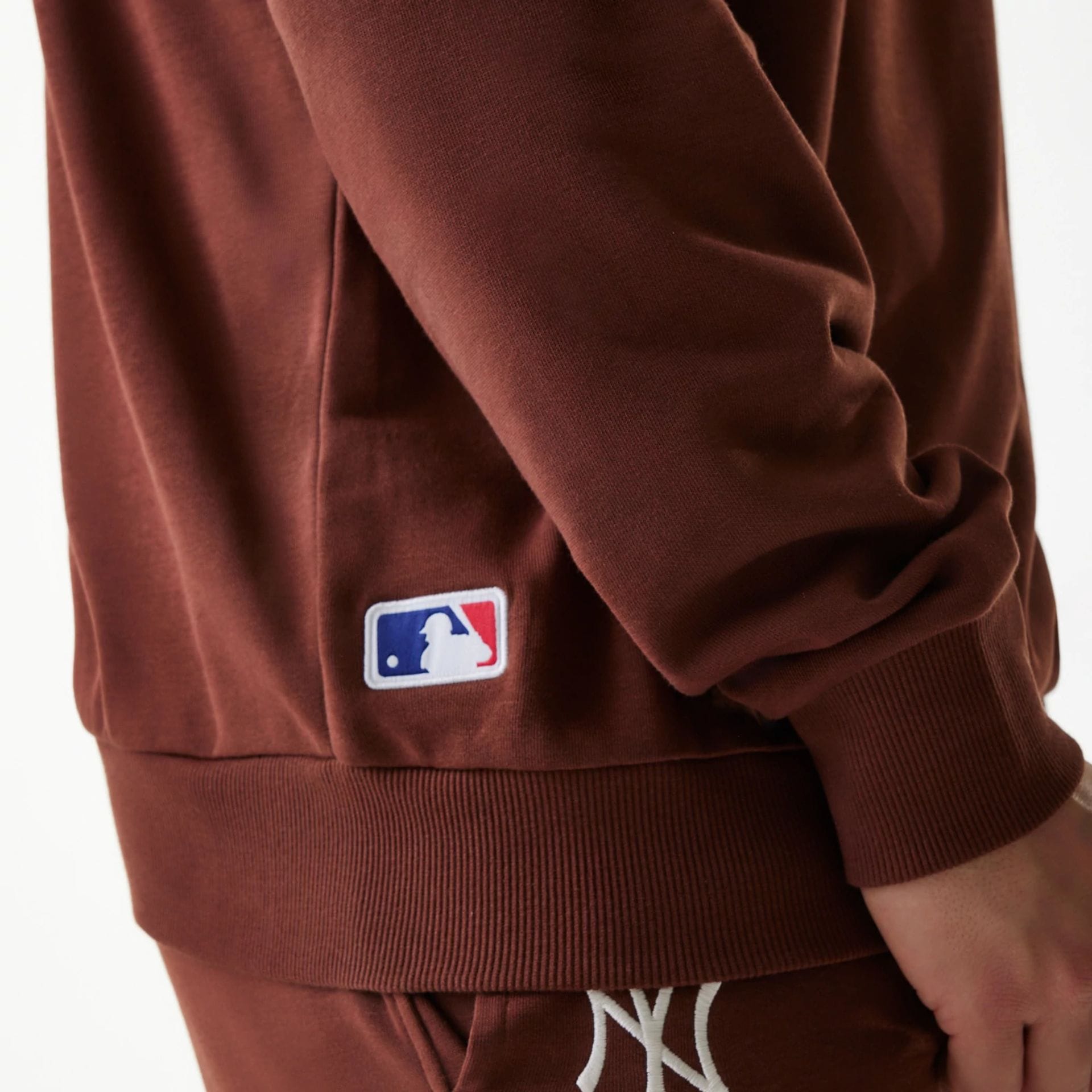 The Male model is wearing New York Yankees MLB Midi League Essential Brown Oversized Crew Neck Sweater 5