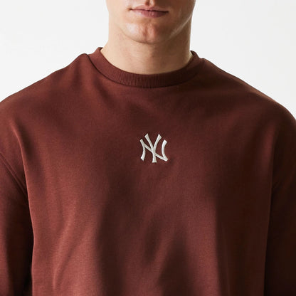 The Male model is wearing New York Yankees MLB Midi League Essential Brown Oversized Crew Neck Sweater 4