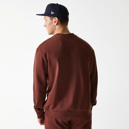 The Male model is wearing New York Yankees MLB Midi League Essential Brown Oversized Crew Neck Sweater 2