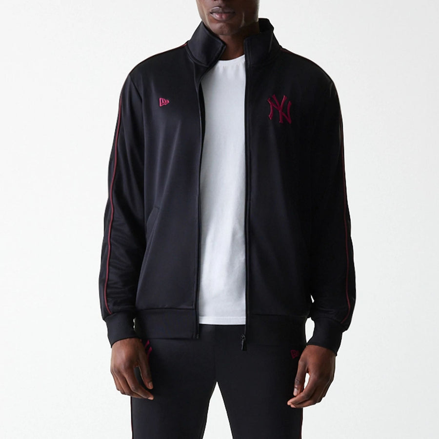 The Male model is wearing New York Yankees MLB Black Track Top 3