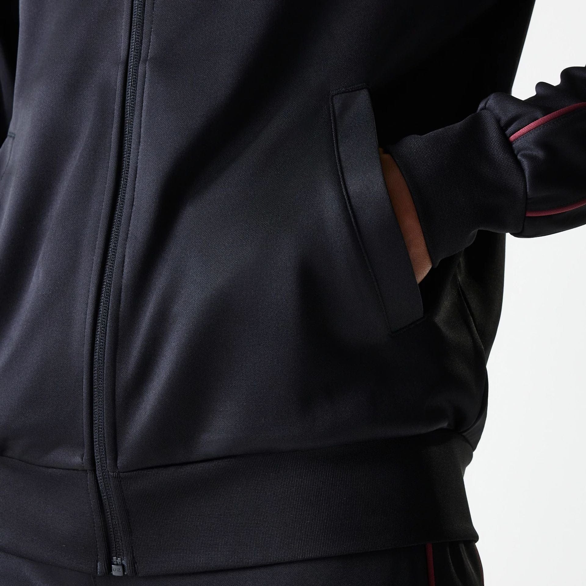 The Male model is wearing New York Yankees MLB Black Track Top 4