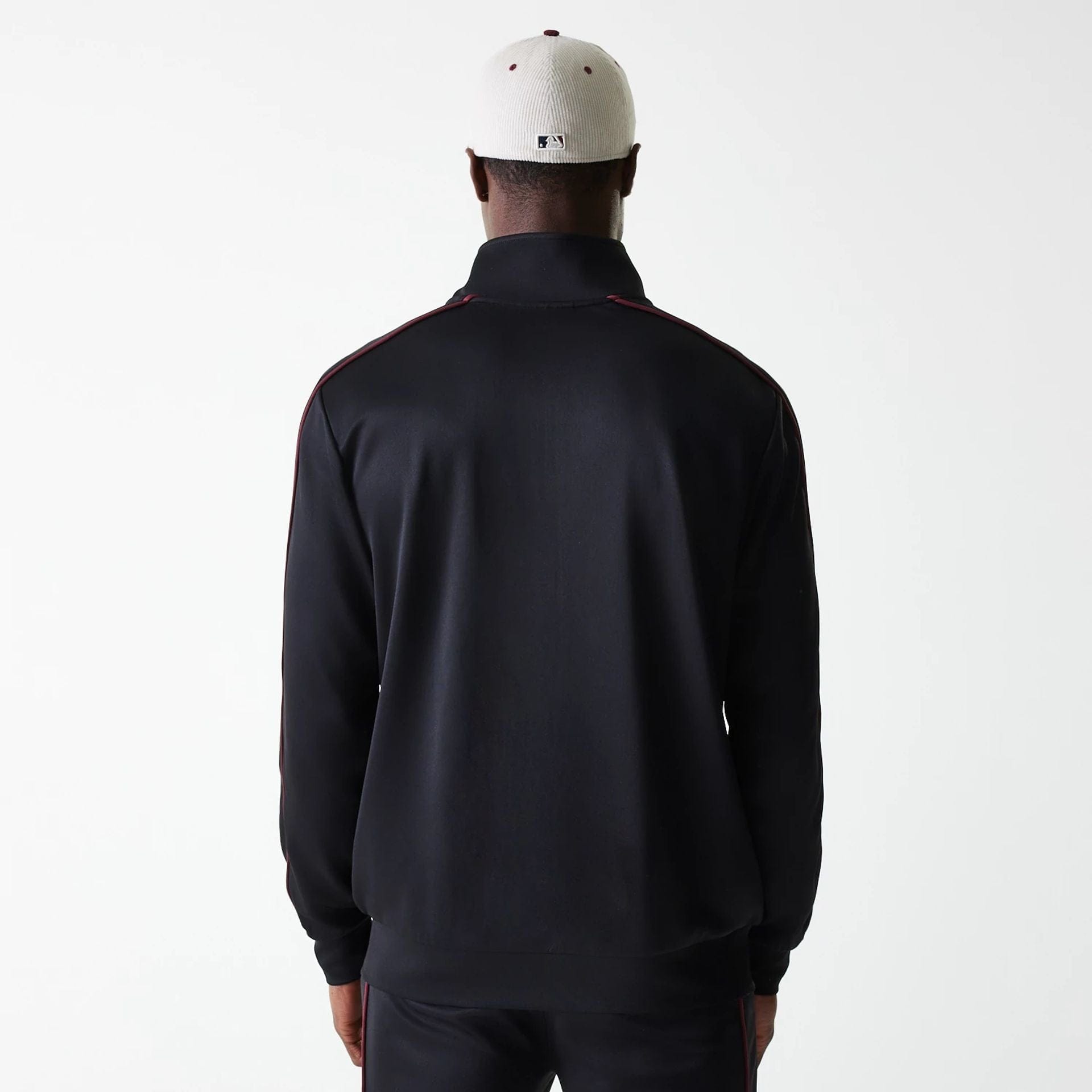 The Male model is wearing New York Yankees MLB Black Track Top 2