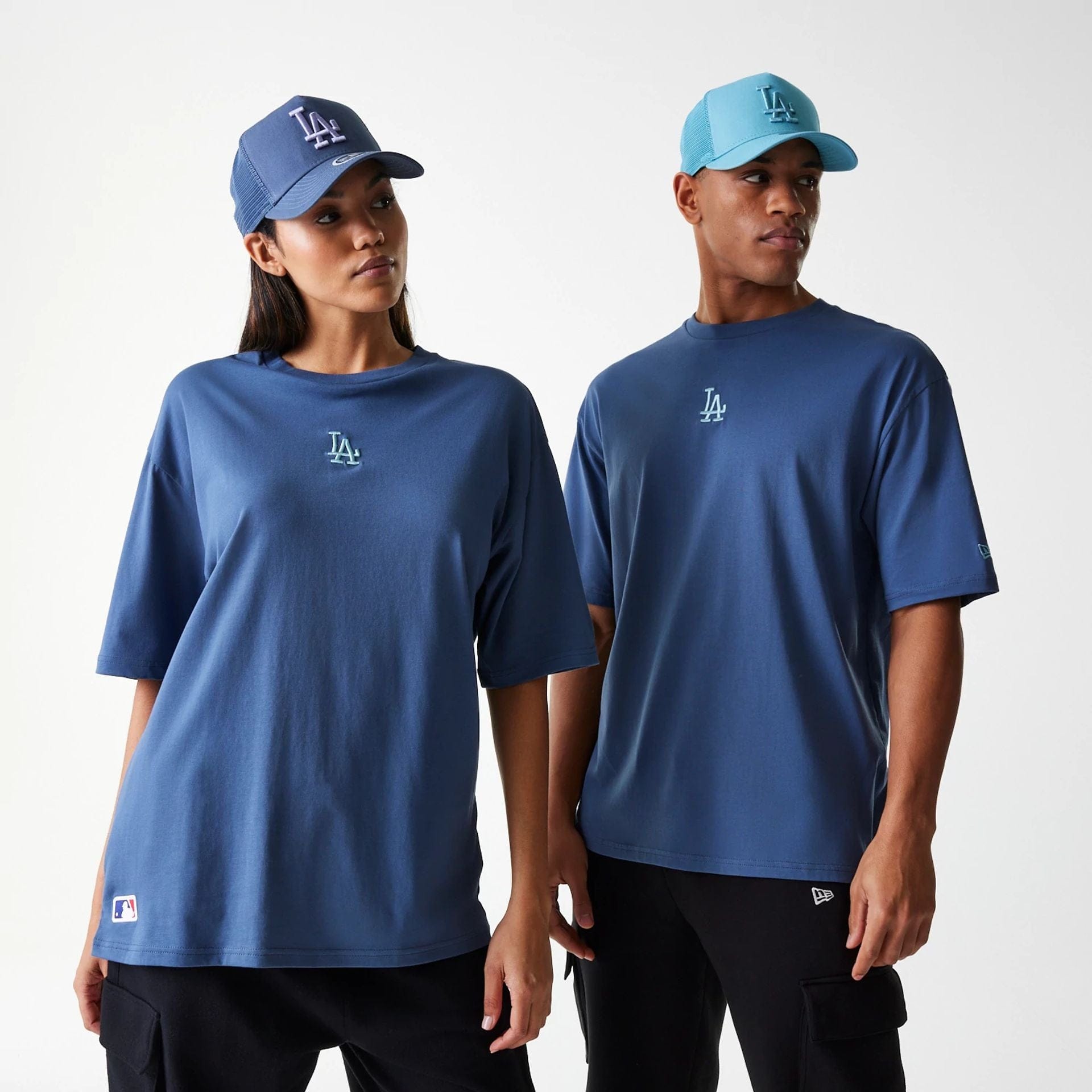 The Male model is wearing LA Dodgers MLB Midi League Essential Dark Blue Oversized T-Shirt 1