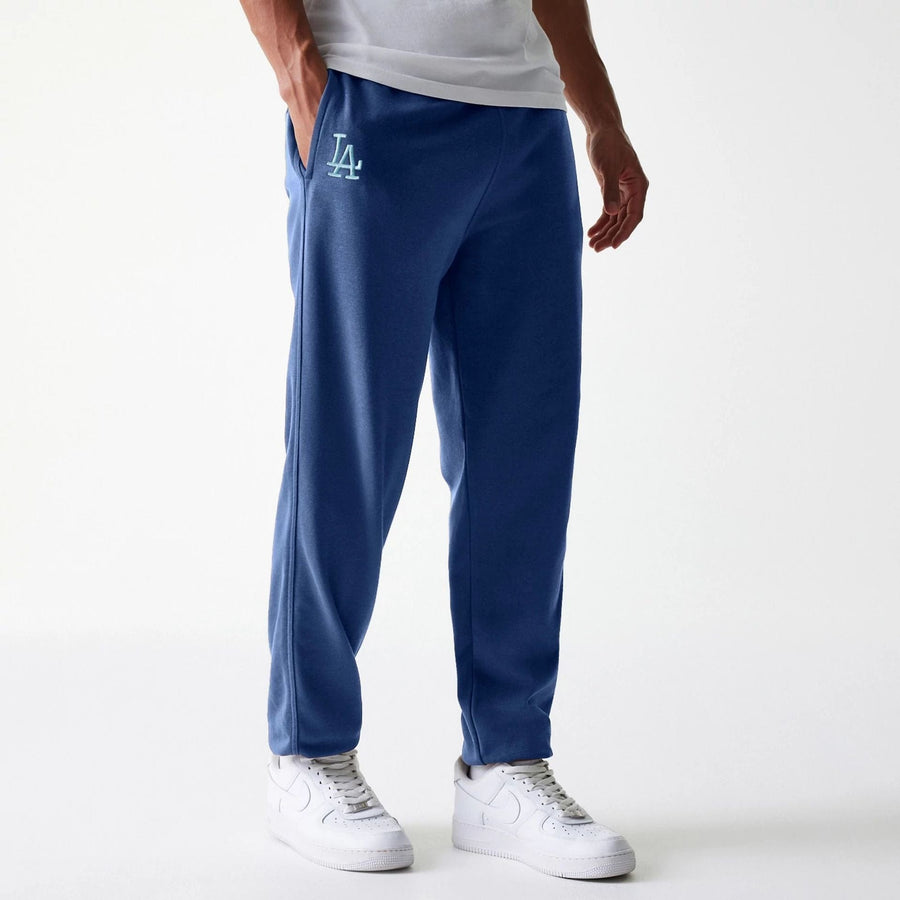 The Male model is wearing LA Dodgers MLB Midi League Essential Blue Joggers 1