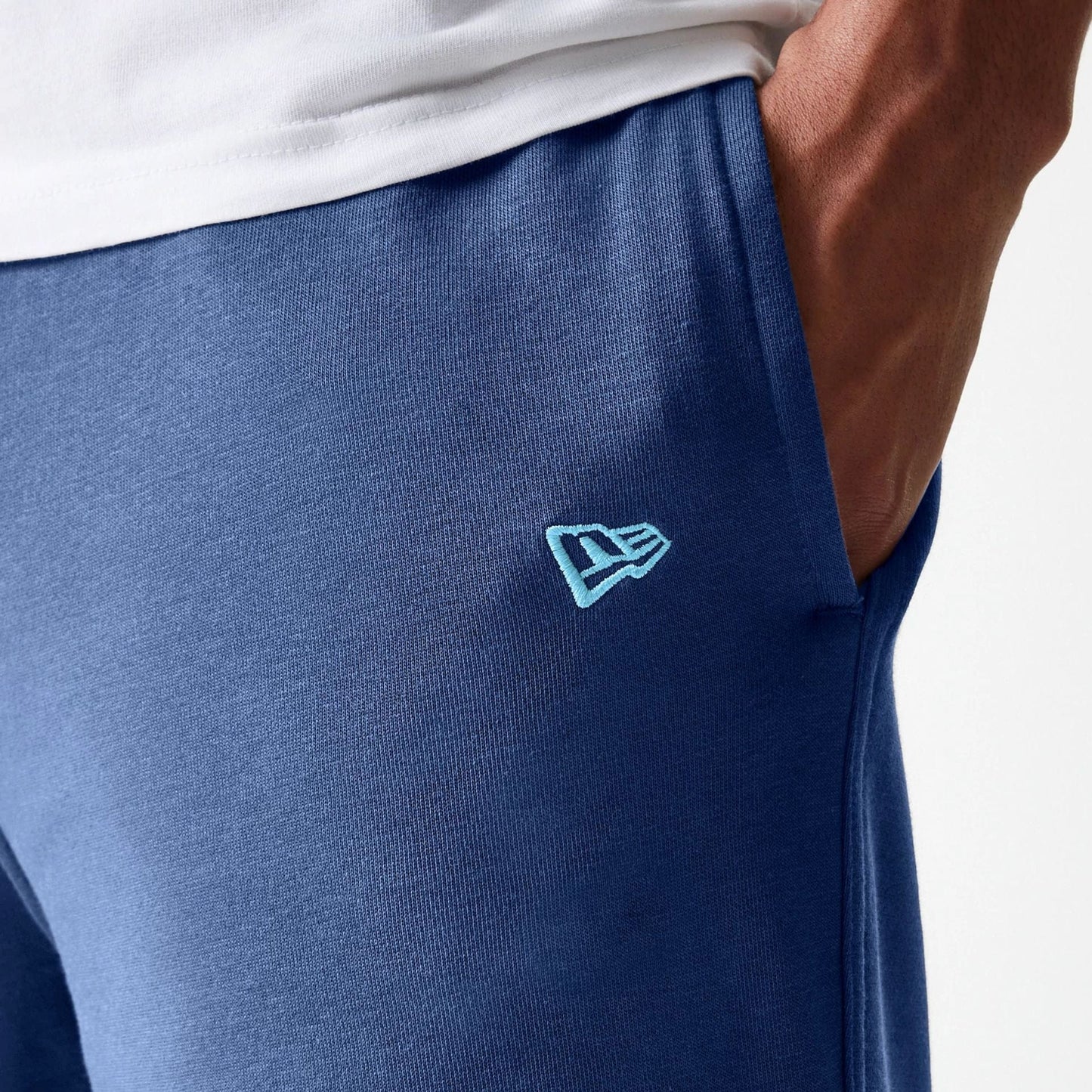 The Male model is wearing LA Dodgers MLB Midi League Essential Blue Joggers 4