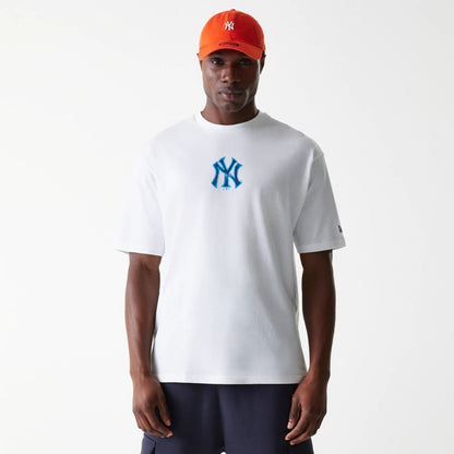 The Male model is wearing New York Yankees MLB World Series White Oversized T-Shirt 1