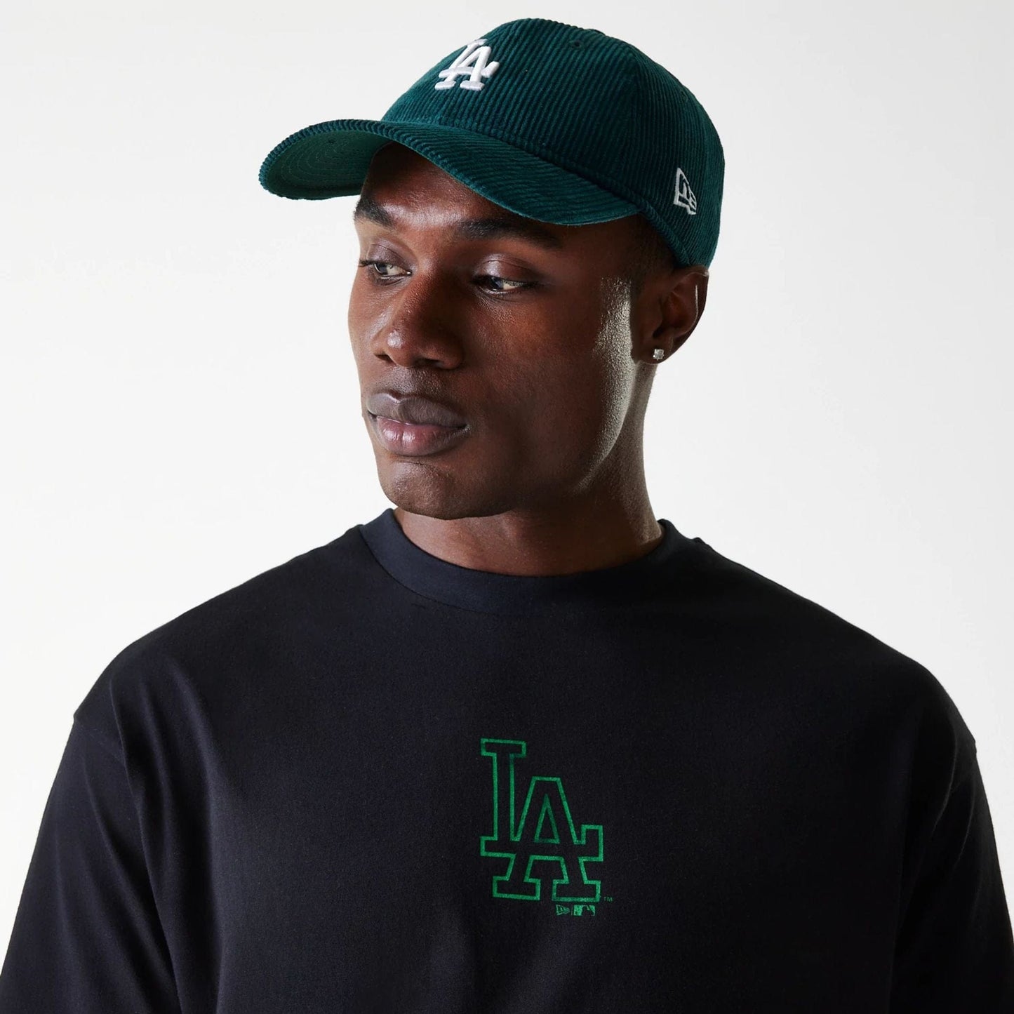 The Male model is wearing LA Dodgers MLB World Series Black Oversized T-Shirt 5