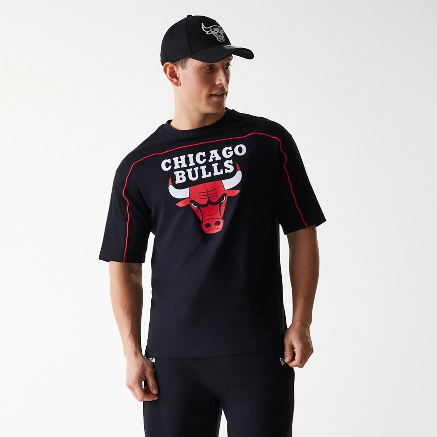 The Male model is wearing Chicago Bulls NBA Piping Black Oversized T-Shirt 3
