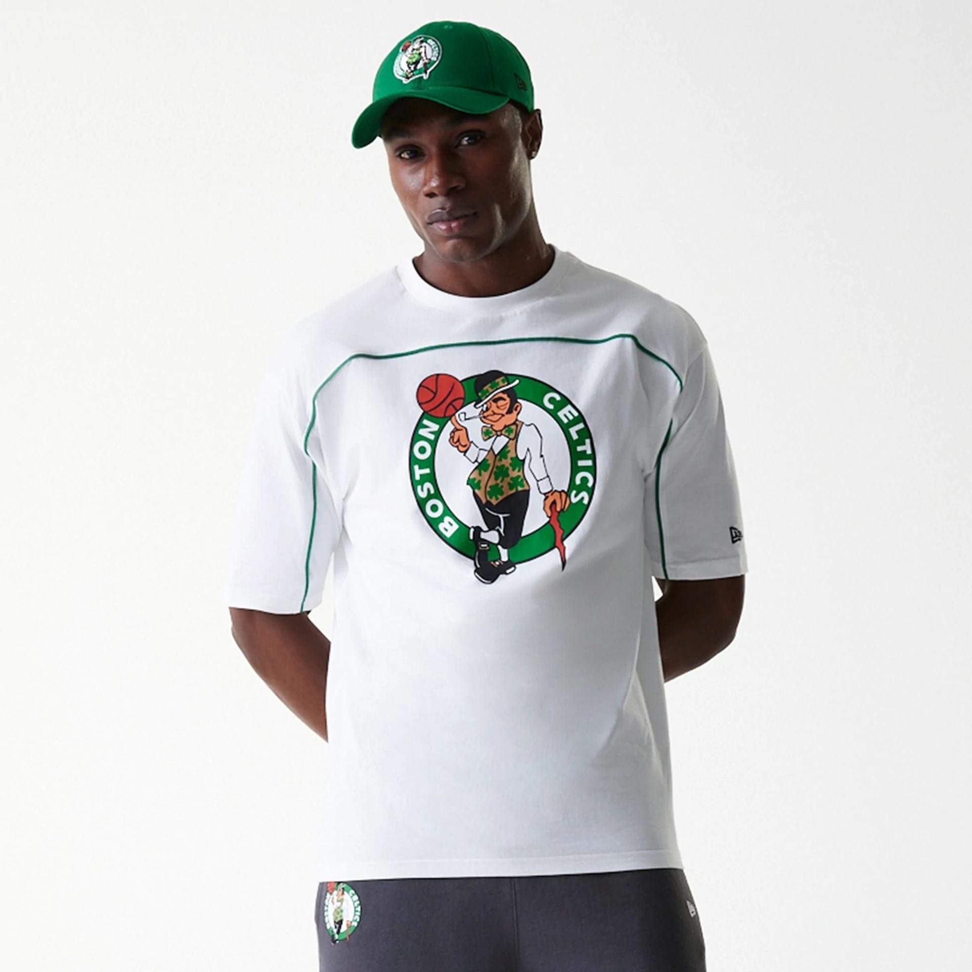 The Male model is wearing Boston Celtics NBA Piping White Oversized T-Shirt 3