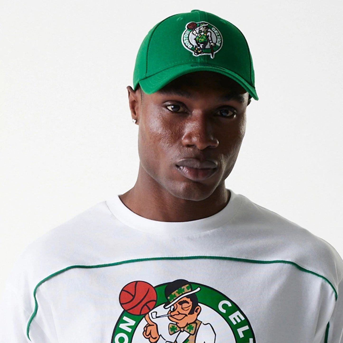 The Male model is wearing Boston Celtics NBA Piping White Oversized T-Shirt 6