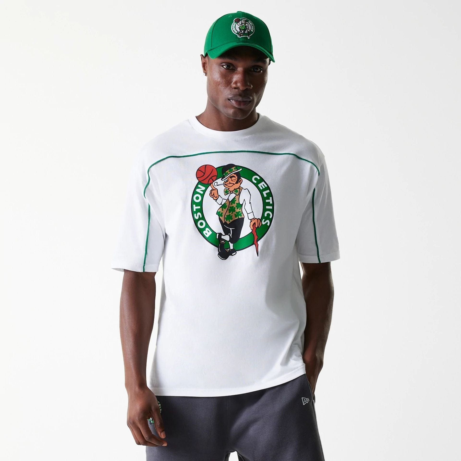 The Male model is wearing Boston Celtics NBA Piping White Oversized T-Shirt 1