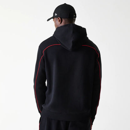 The Male model is wearing Chicago Bulls NBA Piping Black Oversized Pullover Hoodie 2