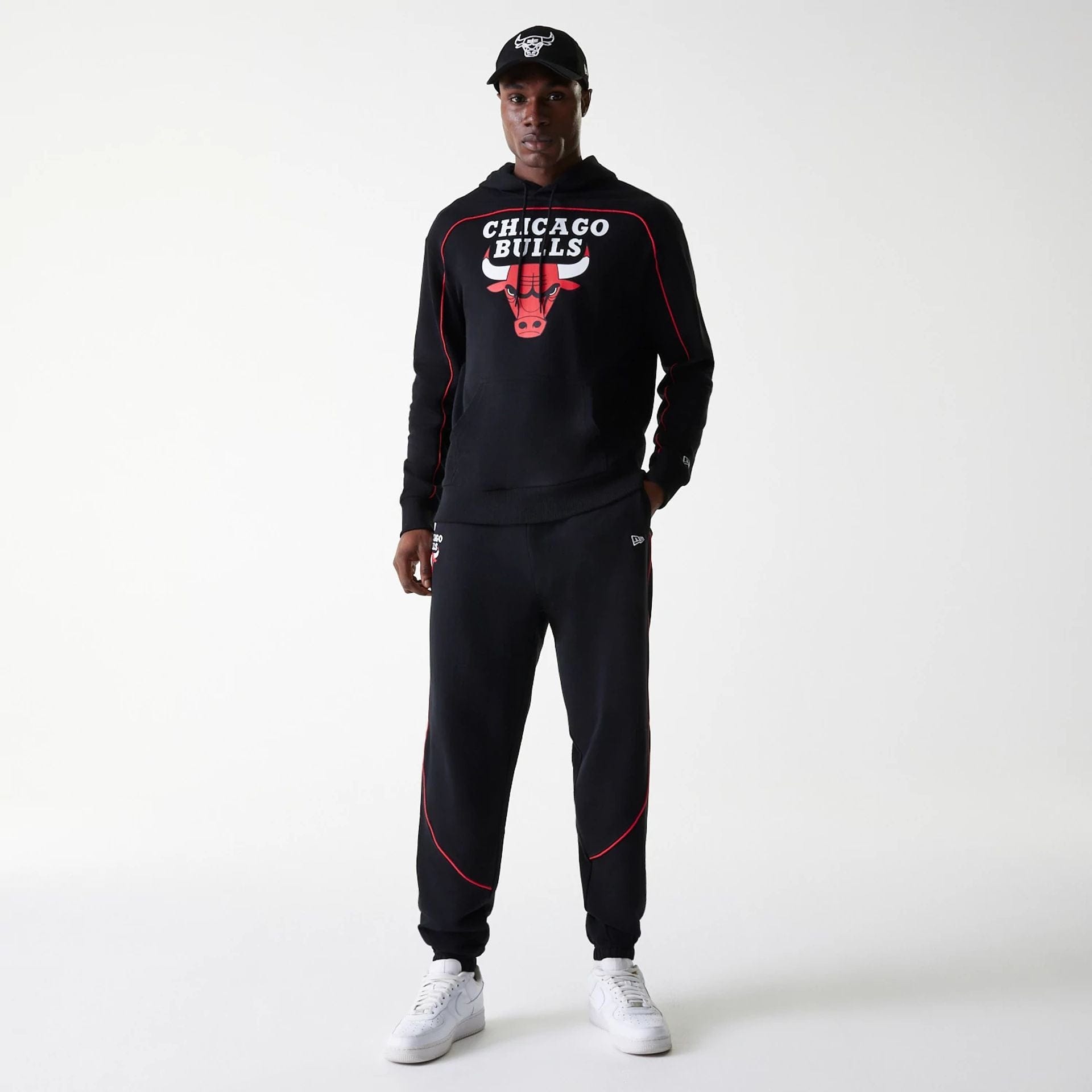 The Male model is wearing Chicago Bulls NBA Piping Black Oversized Pullover Hoodie 8