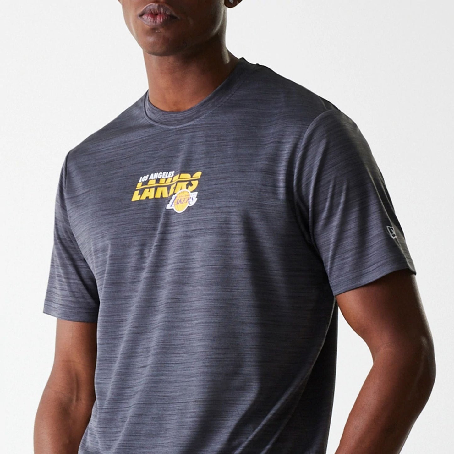 The Male model is wearing LA Lakers NBA Essentials Black T-Shirt 3