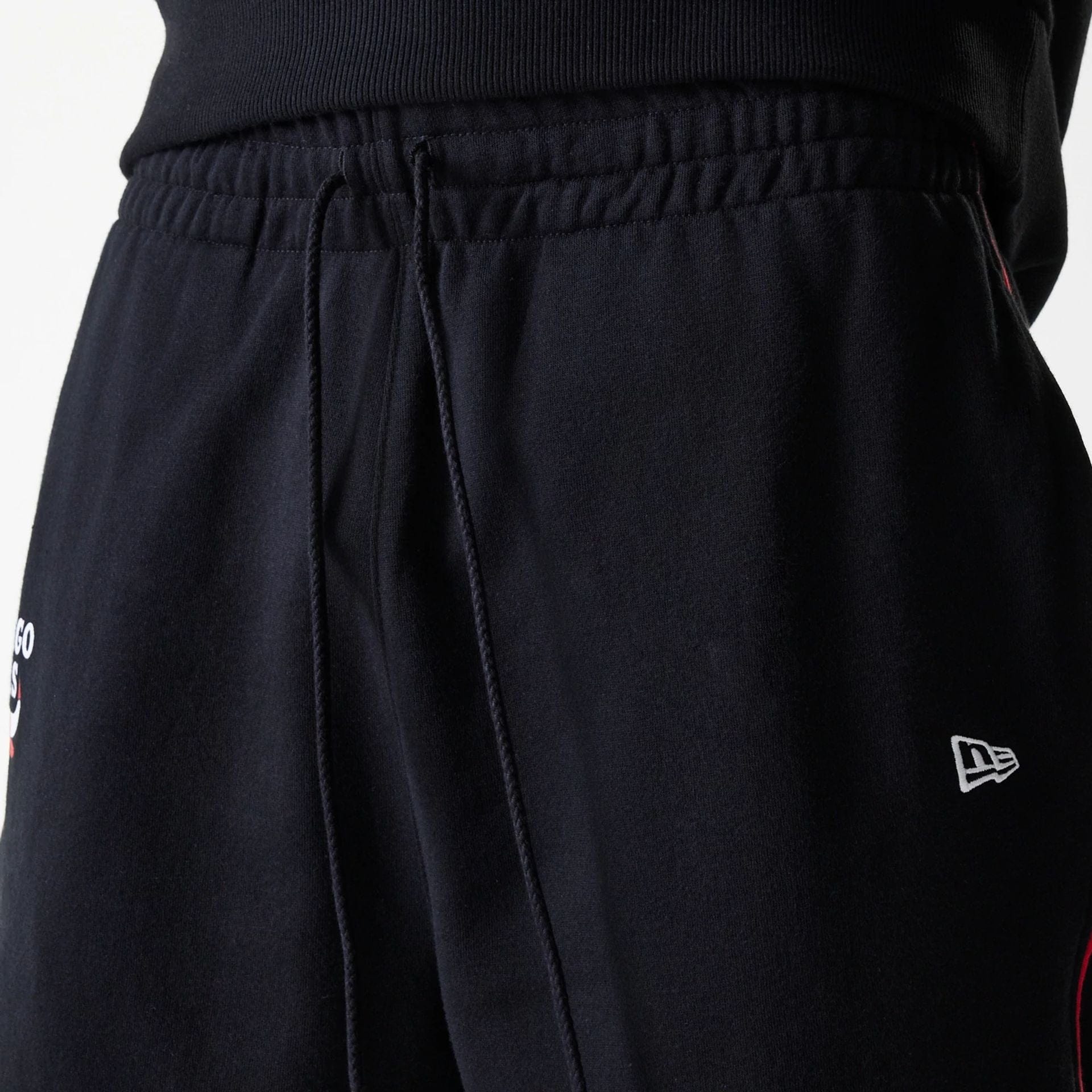 The Male model is wearing Chicago Bulls NBA Piping Black Joggers 5