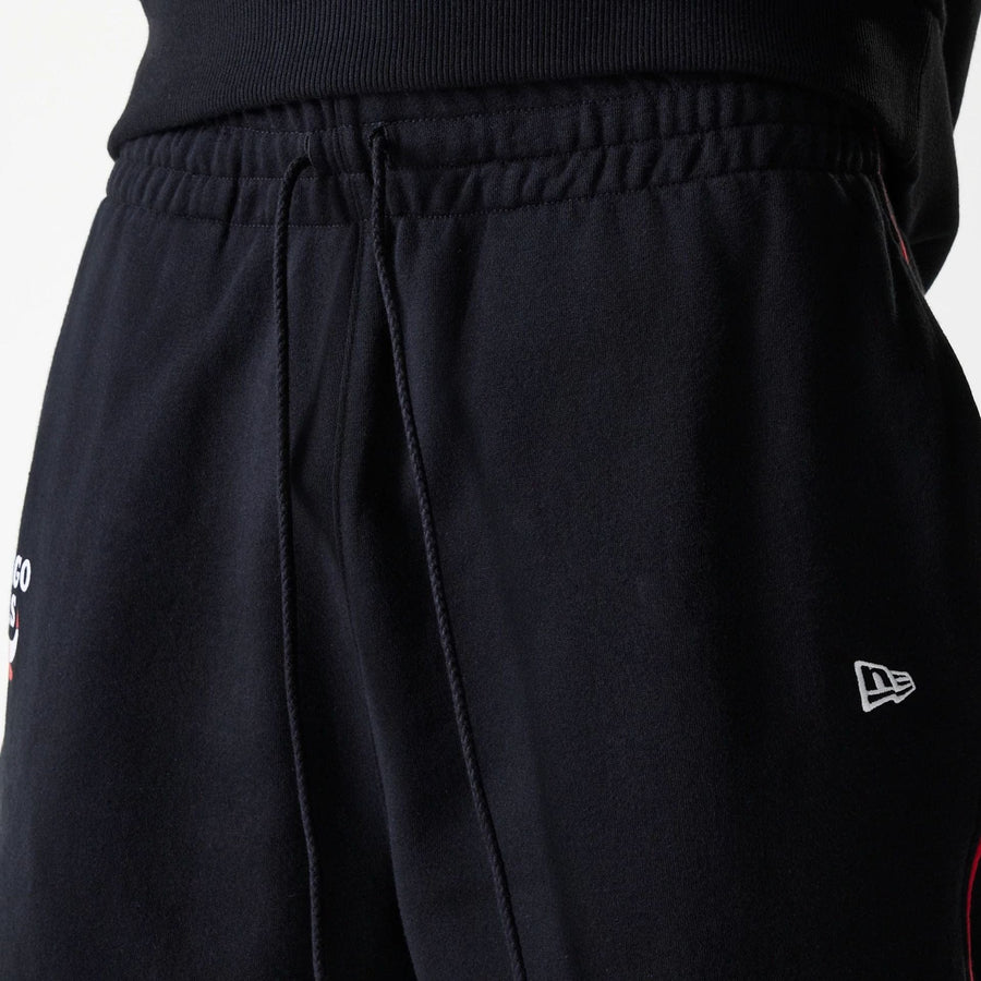 The Male model is wearing Chicago Bulls NBA Piping Black Joggers 5