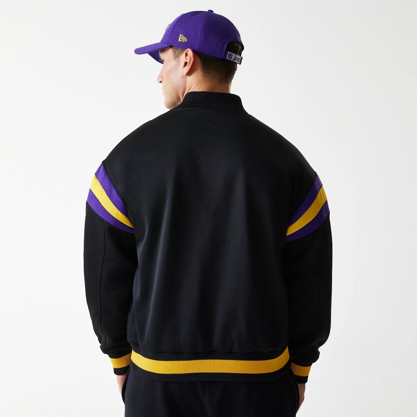 The Male model is wearing LA Lakers NBA Panel Black Bomber Jacket 7