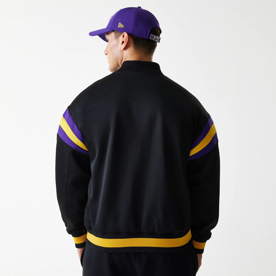The Male model is wearing LA Lakers NBA Panel Black Bomber Jacket 7